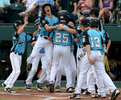Brock Myers of Goodlettsville, Tenn., celebrates with his teammates after hitting a two run home run against Petaluma, Calif., during the Little League World Series U.S. Championship game at Lamade Stadium in South Williamsport, PA. (Mark Zaleski/ For The Tennessean)