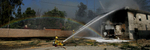 Riverside City firefighters extinguish a structure fire in Riverside, Calif. (The Press-Enterprise/ Mark Zaleski)