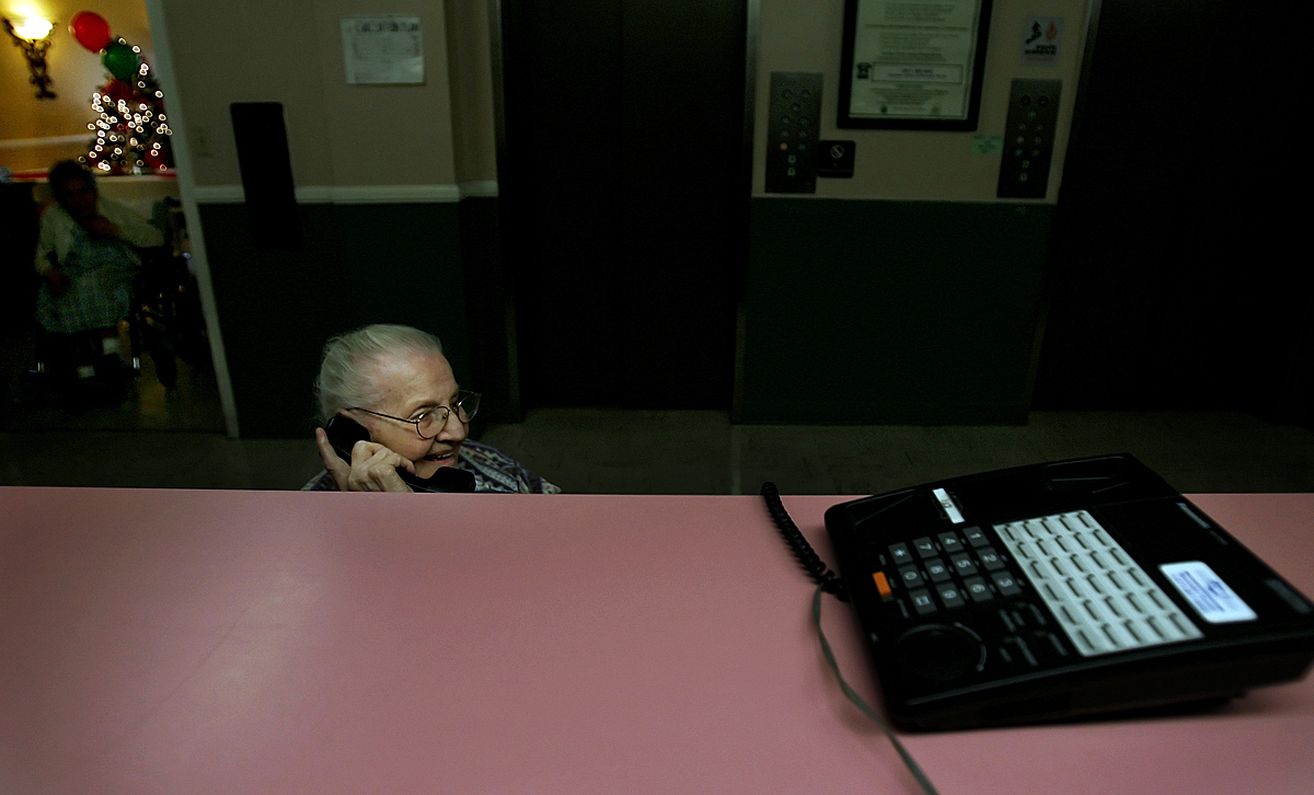 Helen Bodo, 91, talks to her daughter on the phone. {quote}My daughter told me that I will have a place to livesoon, it's just going take a little time{quote} Bodo said. (The Press-Enterprise/ Mark Zaleski)