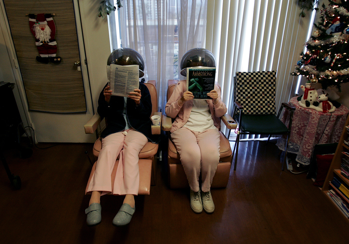 Residents Polly Hardin, 80, left, and Betty Plattner, 83, have their hair dried at the salon on the assisted living floor. (The Press-Enterprise/ Mark Zaleski)