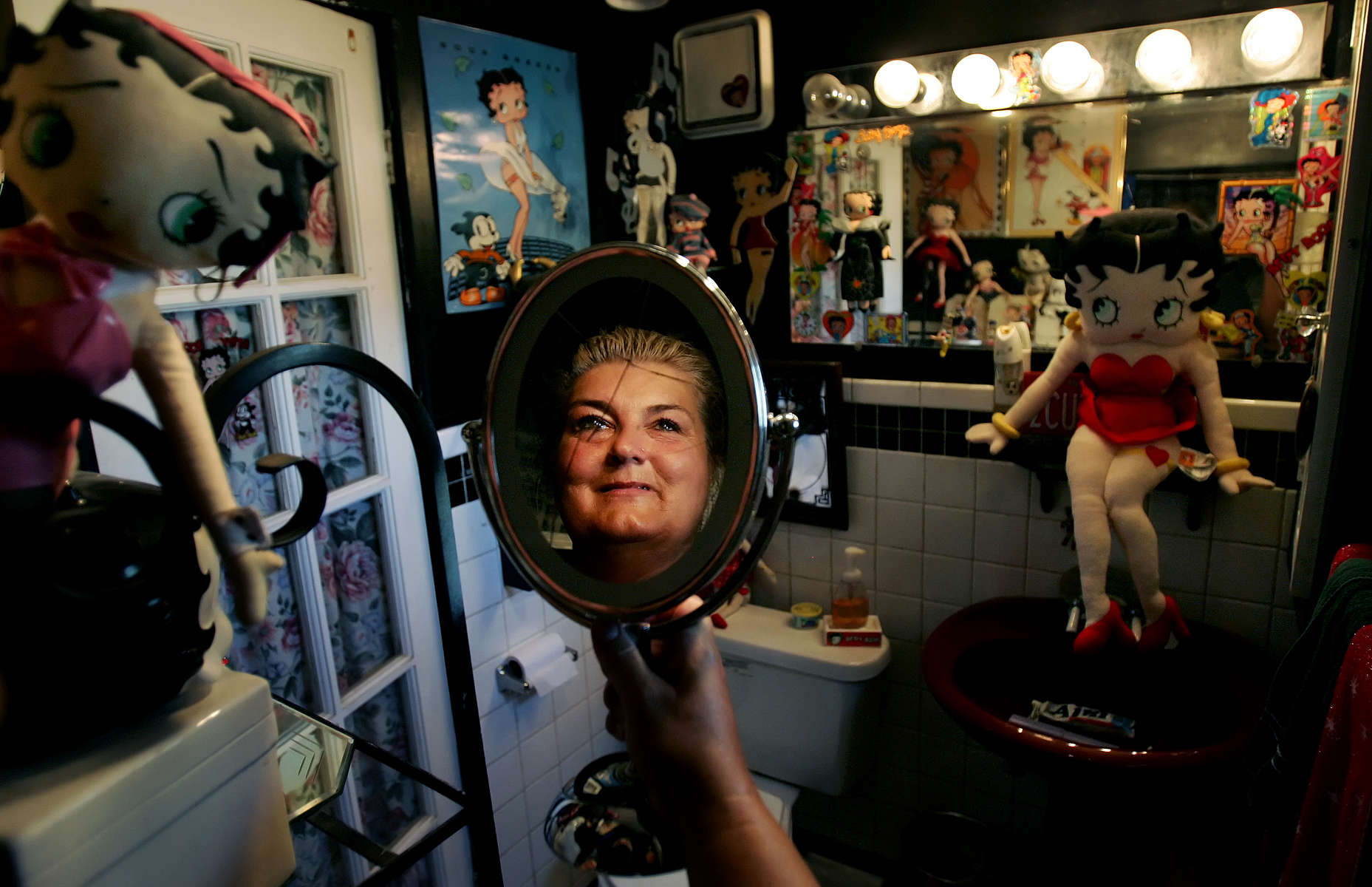 Menifee, Calif., school district trustee Rita Peters of Quail Valley is preparing to be featured on a segment of Rachel Ray's show featuring America's coolest bathrooms. One of hebathrooms has a Betty Boop theme. (The Press-Enterprise/ Mark Zaleski)