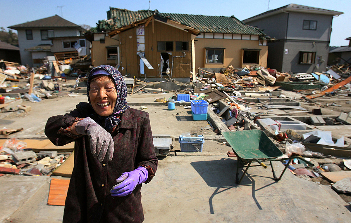 Kiyoe Abe, 80, stops herself from crying then breaks into laughter saying she was glad to have survivedthe massive tsunami that destroyed her home in Shichigahama, a fishing town of northern Sendai, Japan. (The Press-Enterprise/ Mark Zaleski)