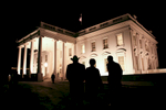 President Bush, Laura Bush: Departure following Reception in Honor of the Chief of Protocol Ambassador Donald Ensenat at Blair House. Walking down Pennsylvania Avenue to the North Grounds of the White House.  Silhouette. POW