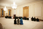 President Bush: Iftaar Dinner with Ambassadors and Muslim Leaders. State Floor. Guests pray in the East Room.