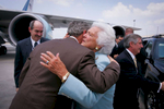 President Bush: Departure from Hartsfield-Jackson Atlanta International Airport. Atlanta, Georgia The President kisses his mother, former First Lady Barbara Bush.