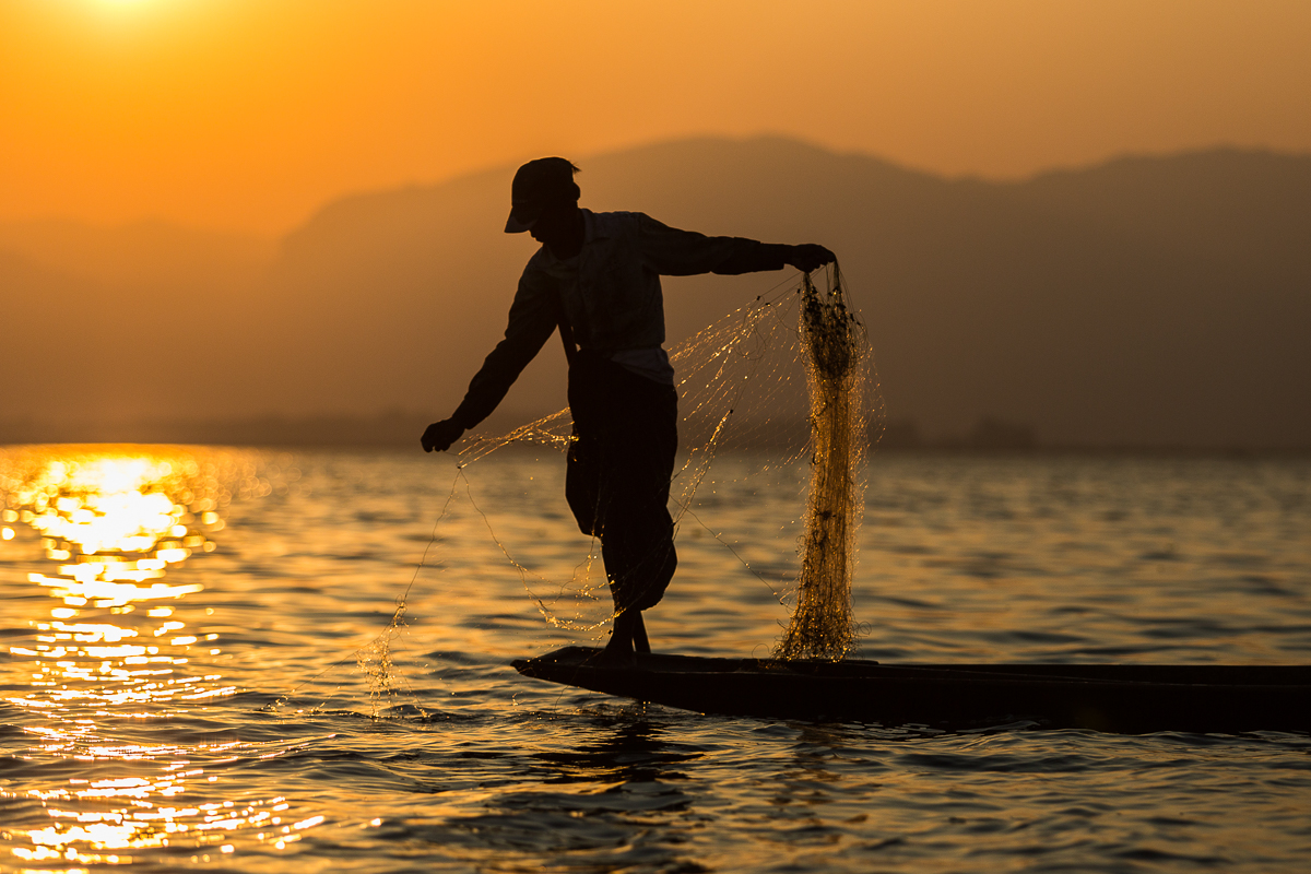 Evening sunset with fishermen