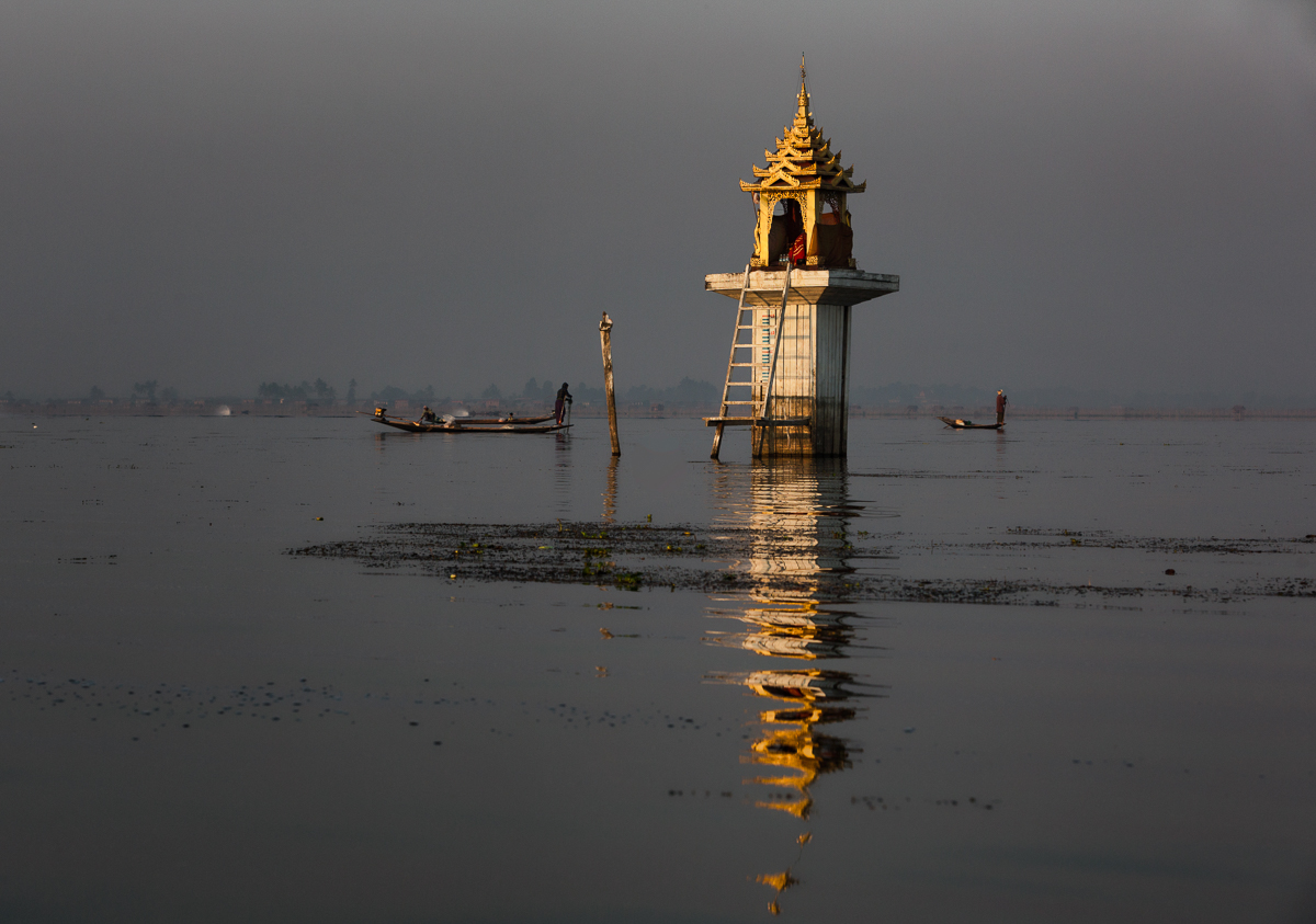 Pagoda in middle of Inle Lake-sun just coming up