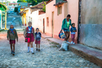 Children hapily strolling to school