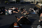 Protesters lie in the middle of the highway for 8 minutes and 46 seconds, the amount of time a Minneapolis police officer held his knee to George Floyd's neck, killing Floyd, during a march as racial inequality protests continue in Washington, U.S., June 23, 2020. REUTERS/Leah Millis
