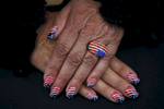 Elizabeth Ritchie with the California Federation of Republican Women shows off her custom nail job for a photograph during the second day of the California Republican Party Convention which featured a speech from Presidential candidate Ted Cruz April 30, 2016 at the Hyatt Regency in Burlingame, Calif.