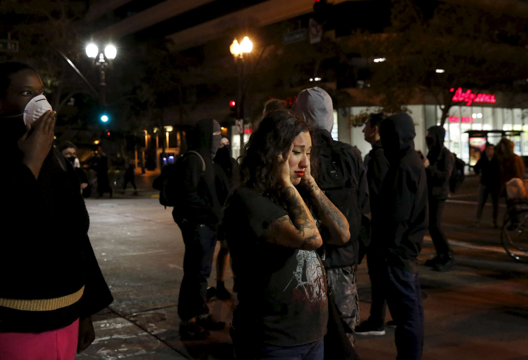 A woman breaks down in tears during an anti-Trump protest Nov. 8, 2016 in Oakland, Calif., after the announcement that Republican presidential candidate Donald J. Trump won the presidential election.