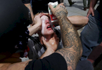 A pro-Trump supporter gets milk poured over his eyes after getting pepper-sprayed during a skirmish on Center Street after a rally called {quote}Patriot's Day Free Speech Rally{quote} in Martin Luther King Jr. Civic Center Park turned violent April 15, 2017 in Berkeley, Calif.