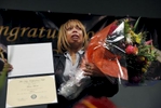 Gwendolyn Woods, the mother of the late Mario Woods who was fatally shot by San Francisco Police, sheds tears as she stands in front of a group of cameras after accepting a diploma for her son during the San Francisco Sheriff's Department's 5 Keys Charter Schools and Programs Community Graduation ceremony Jan. 20, 2015 in San Francisco, Calif.