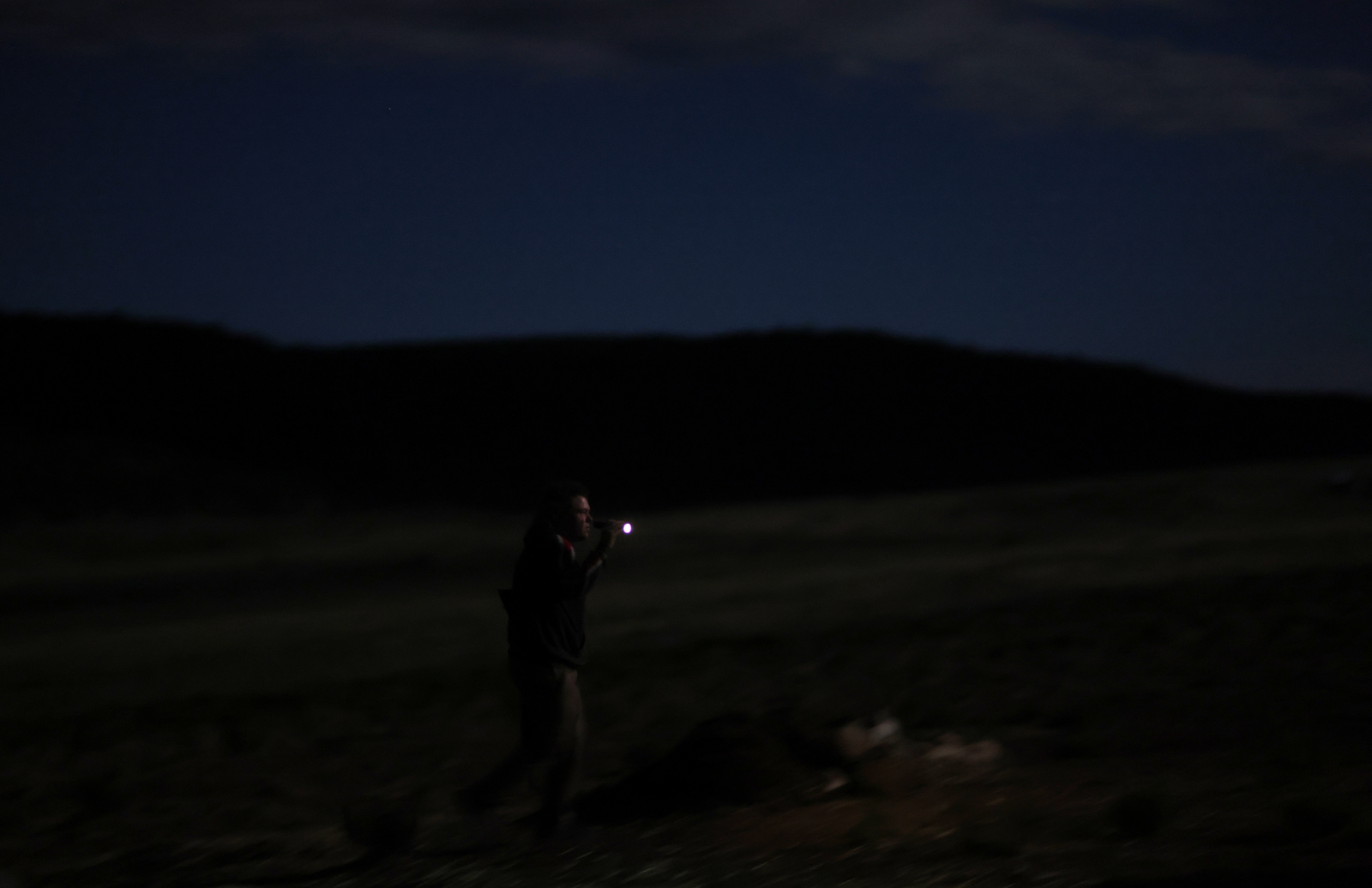 Daisy Hand does a nightly patrol around the Tenacious Unicorn Ranch. The ranchers had restarted nightly patrols after a news media article about them was published and they saw an uptick in threats of physical violence. 
