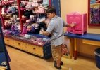 James Kaplan, 8, looks for accessaries for his newly made stuffed dog after finding him a batman costume at Build-A-Bear Workshop in Hillsdale Shopping Center August 11, 2016 in San Mateo, Calif. Sara took both of her children to the store to reward them for doing something physically active every day for 30 days straight. 