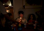 James Kaplan, 9, reacts to his birthday candle and personal cake as everyone sings to him Dec. 1, 2016 during his birthday party in Berkeley, Calif. James counted down the days until his birthday, which he and his mother decided to use the theme of {quote}one year old{quote} to celebrate his first full year living as his true self.