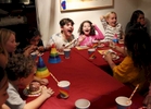 James Kaplan, 9, center, laughs with friends after smashing his face into his cake, from left, Serene Kimball, 8, Simone Zabarsky, 8, Clara, 8, Juna French, 8, and Audrey Malker, 8 Dec. 1, 2016 during his birthday party in Berkeley, Calif. James counted down the days until his birthday, which he and his mother decided to use the theme of {quote}one year old{quote} to celebrate his first full year living as his true self.
