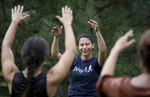 Kim Woodruff, a survivor of the Columbine shooting, teaches a tai chi class to fellow survivors during the family dinner portion of the annual survivor's gathering with The Rebels Project July 28, 2018 in Parker, Colorado, US.