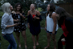 Mass shooting survivors, from left, Heather Martin of Columbine, Ellen Davis of Route 91 Las Vegas, Hayley Steinmuller of Route 91 Las Vegas, Amy Over of Columbine and Becca La Creta of Virginia Tech laugh together as they hang out during the family dinner portion of the annual survivor's gathering with The Rebels Project July 28, 2018 in Parker, Colorado, US.