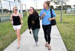 Heather Martin, who survived the shooting at Columbine high school nearly 20 years ago, chats with Ava Steil, 16, center, and Brianna Jesionowski, 16, April 2, 2019, both students survived the Marjory Stoneman Douglas shooting last year, in Parkland, Florida, US. The Rebels Project members were invited to Florida to participate in a Parkland MSD Community Peer Support Event. The students interviewed Martin along with two other The Rebels Project members for their student paper.