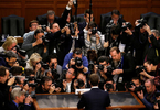Facebook CEO Mark Zuckerberg is surrounded by members of the media as he arrives to testify before a Senate Judiciary and Commerce Committees joint hearing regarding the company’s use and protection of user data, on Capitol Hill in Washington, U.S., April 10, 2018. REUTERS/Leah Millis     TPX IMAGES OF THE DAY