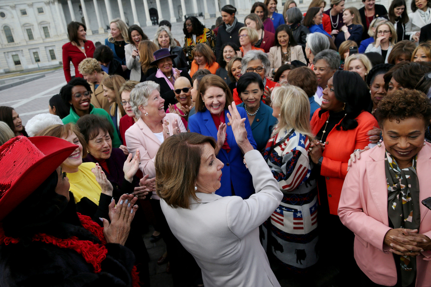 U.S. House Speaker Nancy Pelosi (D-CA) celebrates with most of the House Democratic women after a group photograph was taken of them all on the second day of the new (116th) Congress on Capitol Hill in Washington, U.S., January 4, 2019.