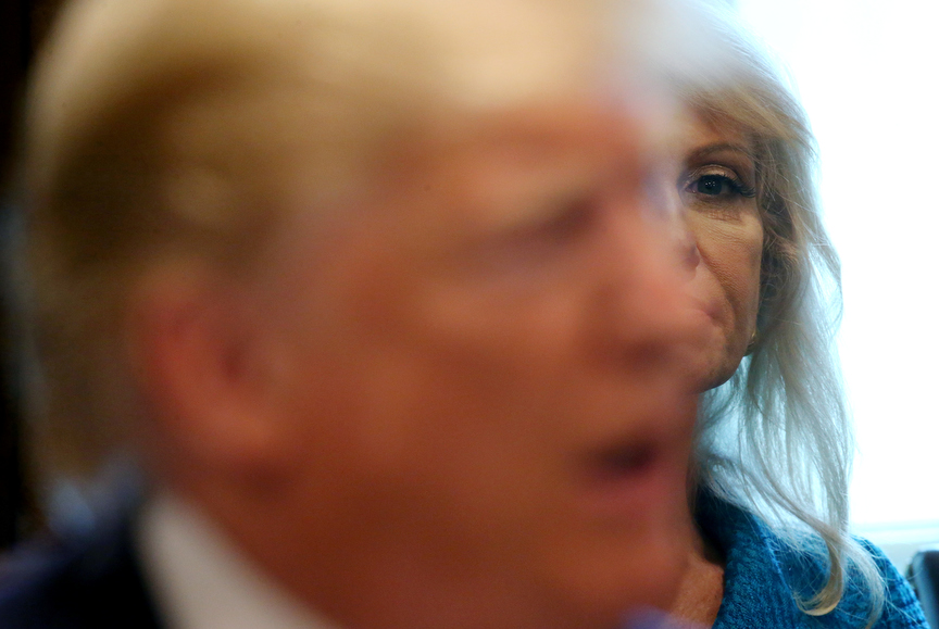 White House Counselor Kellyanne Conway listens to U.S. President Donald Trump addressing the news media during a cabinet meeting at the White House in Washington, U.S., July 16, 2019. REUTERS/Leah Millis