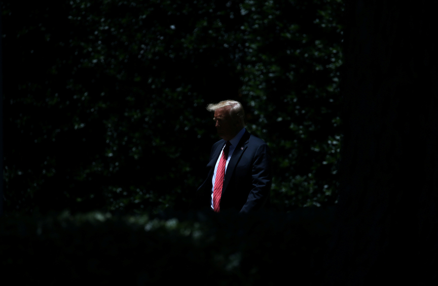 U.S. President Donald Trump leaves the Oval Office to speak to the news media before boarding Marine One to depart for travel to Iowa from the South Lawn of the White House in Washington, U.S., June 11, 2019.