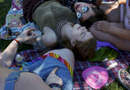 Clockwise from lower left, Bee Geiger, Emma Cushman, Violet Moyer and Alex Quiroz lounge together with friend Rach Pitts (not visible) before the start of the Trans March in Mission Dolores park June 23, 2017 in San Francisco, Calif. The annual march kicks off a weekend of Pride events held around the city.