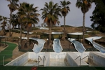 Water slides that are used as part of a local business that runs completely off of recycled water May-Sept. can be seen dry during the off season April 9, 2015 in Tulare, Calif.
