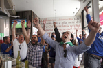Italy fans Emanuele Gastel, 25, right, cheers with Savino Cancellara, 30, center, and Vince Lamanna, far left, after Italy scored the first goal during the England vs. Italy World Cup match June 14, 2014 at Il Casaro in San Francisco, Calif.