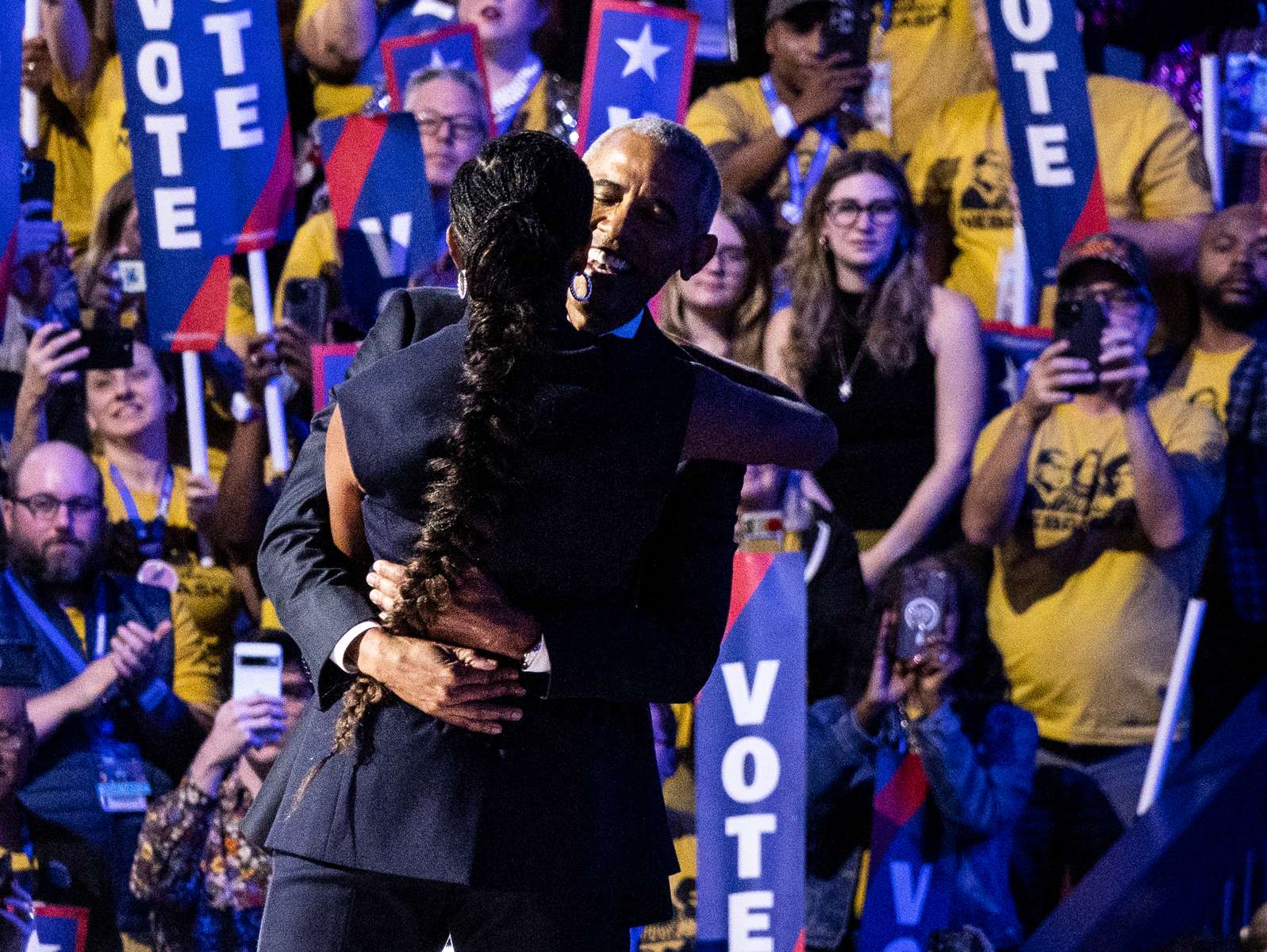 Barack Obama and Michelle Obama during the second day of the the Democratic National Convention (DNC) at the United Center in Chicago, Illinois, US, on Tuesday, August 20, 2024. The 2024 Democratic National Convention, held from 19 to 22 August 2024, is when delegates of the United States Democratic Party will select the party's nominees for president and vice president in the 2024 United States presidential election.  MAXPPP/AUDE GUERRUCCI