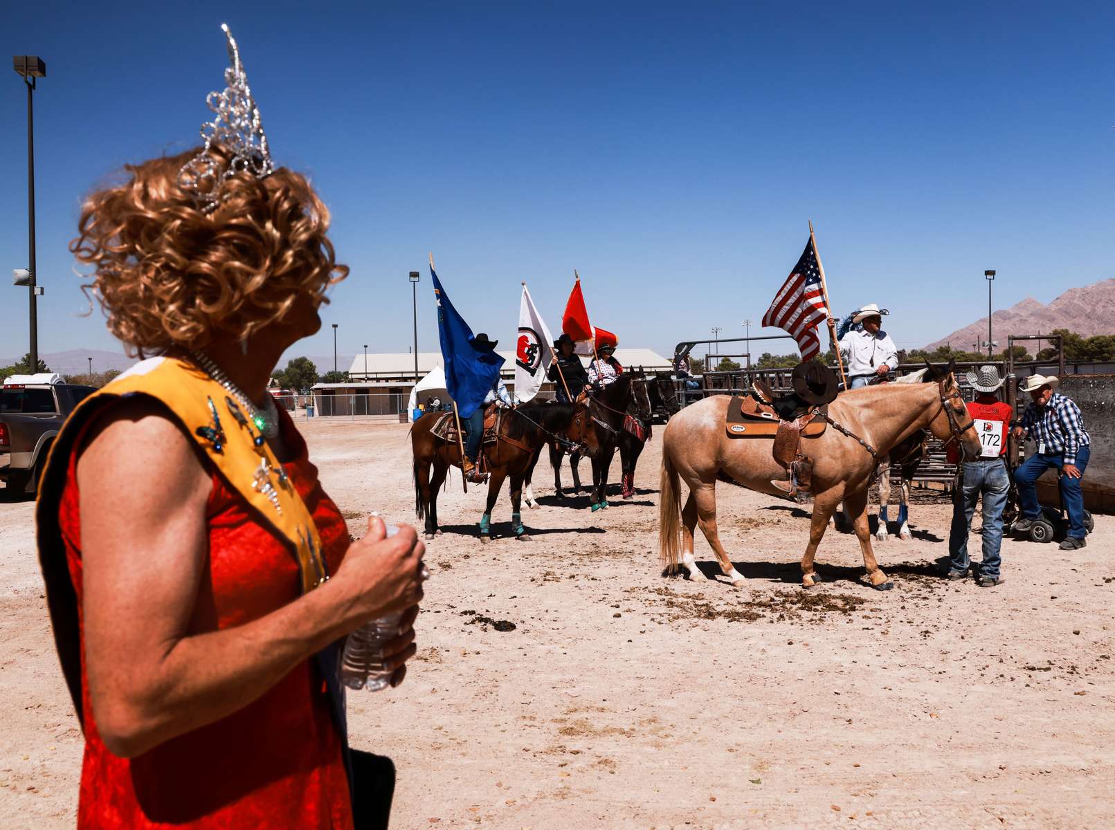 Felinda Bush (l) walks on the second day of the Bighorn rodeo, in Las Vegas on September 19, 2021.Bighorn rodeo is organized by the Nevada Gay Rodeo Association, an all-volunteer,  organization dedicated to preserving the western lifestyle and producing gay rodeos with a commitment to raise funds for charitable organizations. Over the years, NGRA has raised many thousands of dollars for local charities.