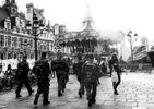 A group of militaries walk in front of the Hotel de Ville, the mayor of Paris' office, on December 21, 2015, Paris, France. 3000 of additional militaries were deployed in Paris after the terrorist attacks of November 13. 