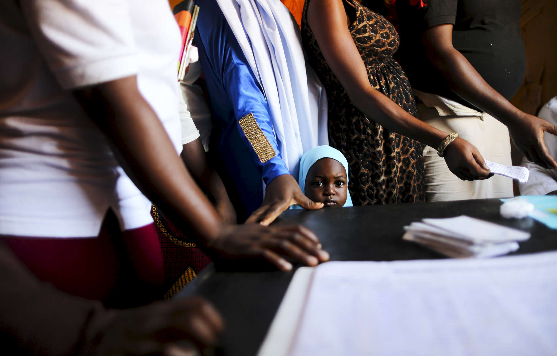 Pregnant patients wait for a consultation at the medical facility of Kuchigoro  in Abuja, Nigeria.