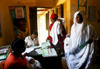 Patients arrive vaccination day, in the medical facility of Kuchigoro in Abuja, Nigeria.