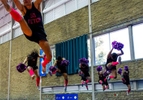 Members of Cheer New York Pom practice their routine before the final of the cheerleading competiton at the Gay Games, in Guadalajara, Mexico, on November 8, 2023.