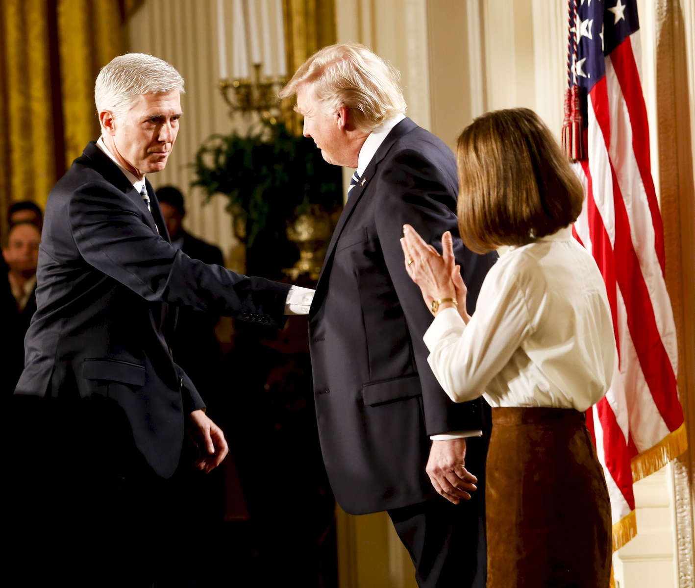 U.S. President Donald Trump shakes hands with nominate Judge Neil Gorsuch to the Supreme Court, in the East Room of the White House.