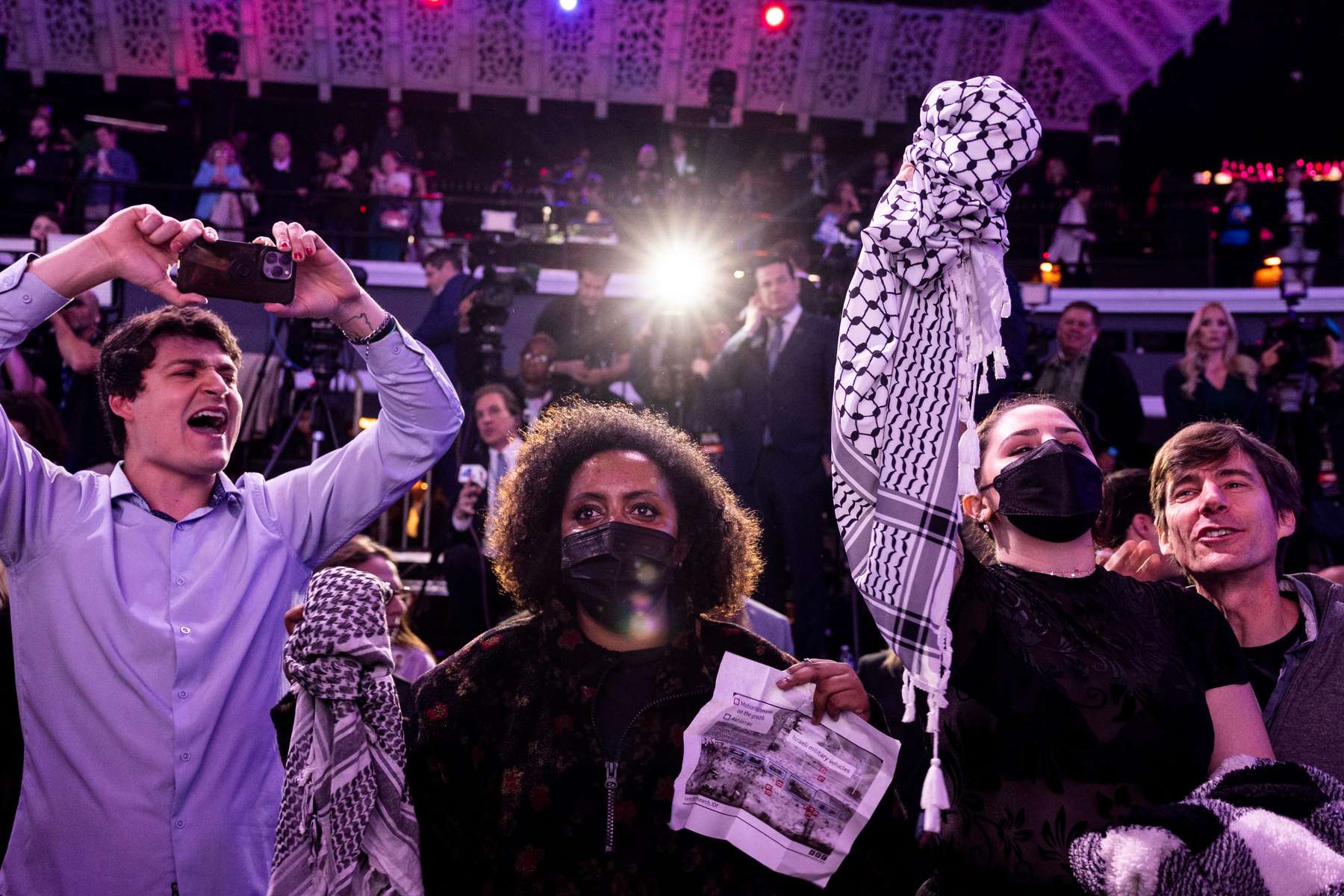 Protestors yell as Adam Schiff speaks during an election party at the Avalon in Los Angeles Tuesday night as he seeks to replace Sen. Diane Feinstein in the Senate, Los Angeles, California March 6, 2024.