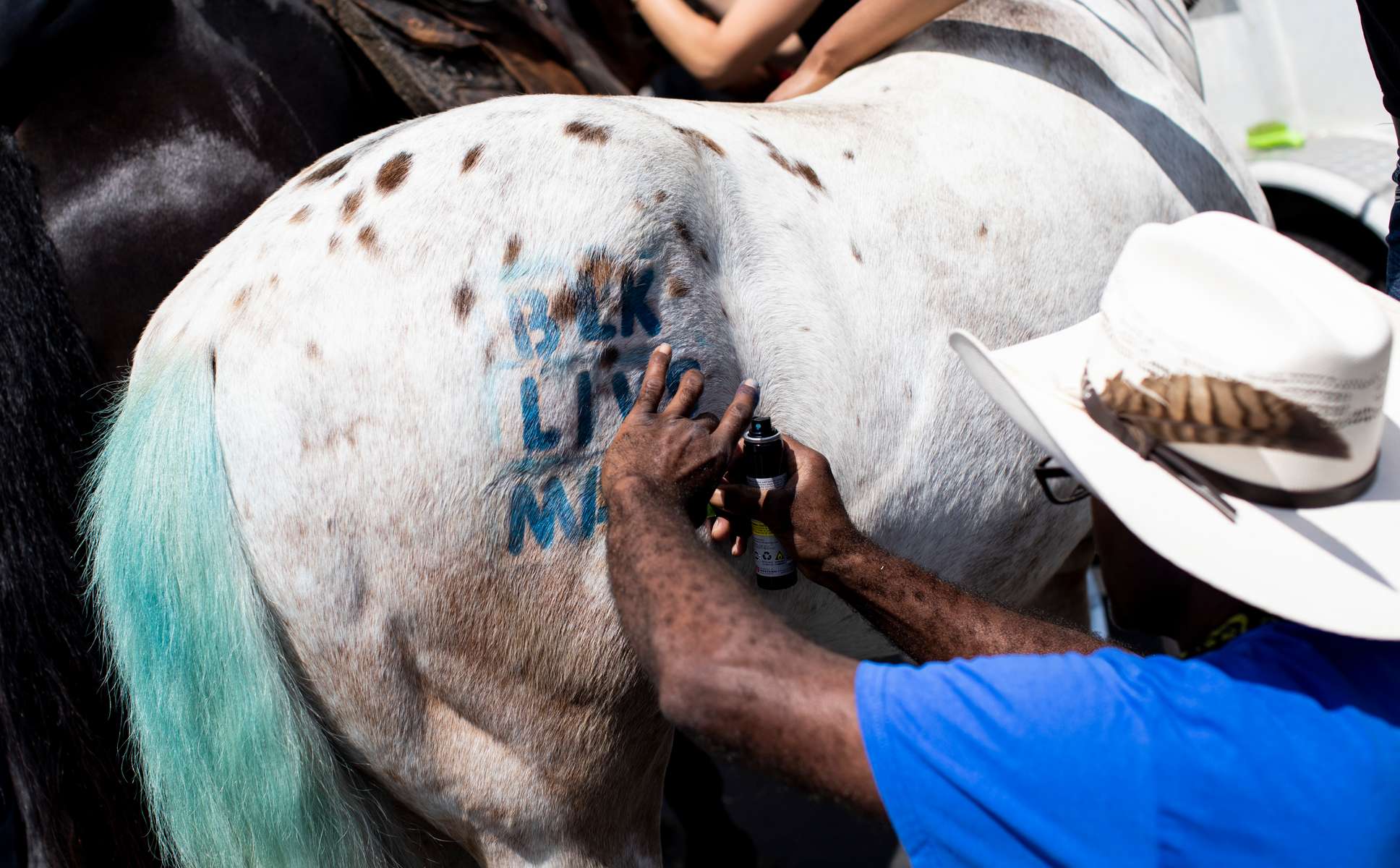 A participant prepares his horse before a {quote}peace ride{quote} for George Floyd organized by the Compton Cowboys on June 7, 2020, in Compton, California.This is the 13th day of protests since George Floyd died in Minneapolis police custody on May 25. 