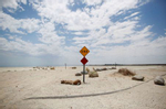 An end sign is seen in front of a beach of the Salton Sea, as California faces its worst drought since 1977, in Salton City, California, U.S., July 4, 2021. 