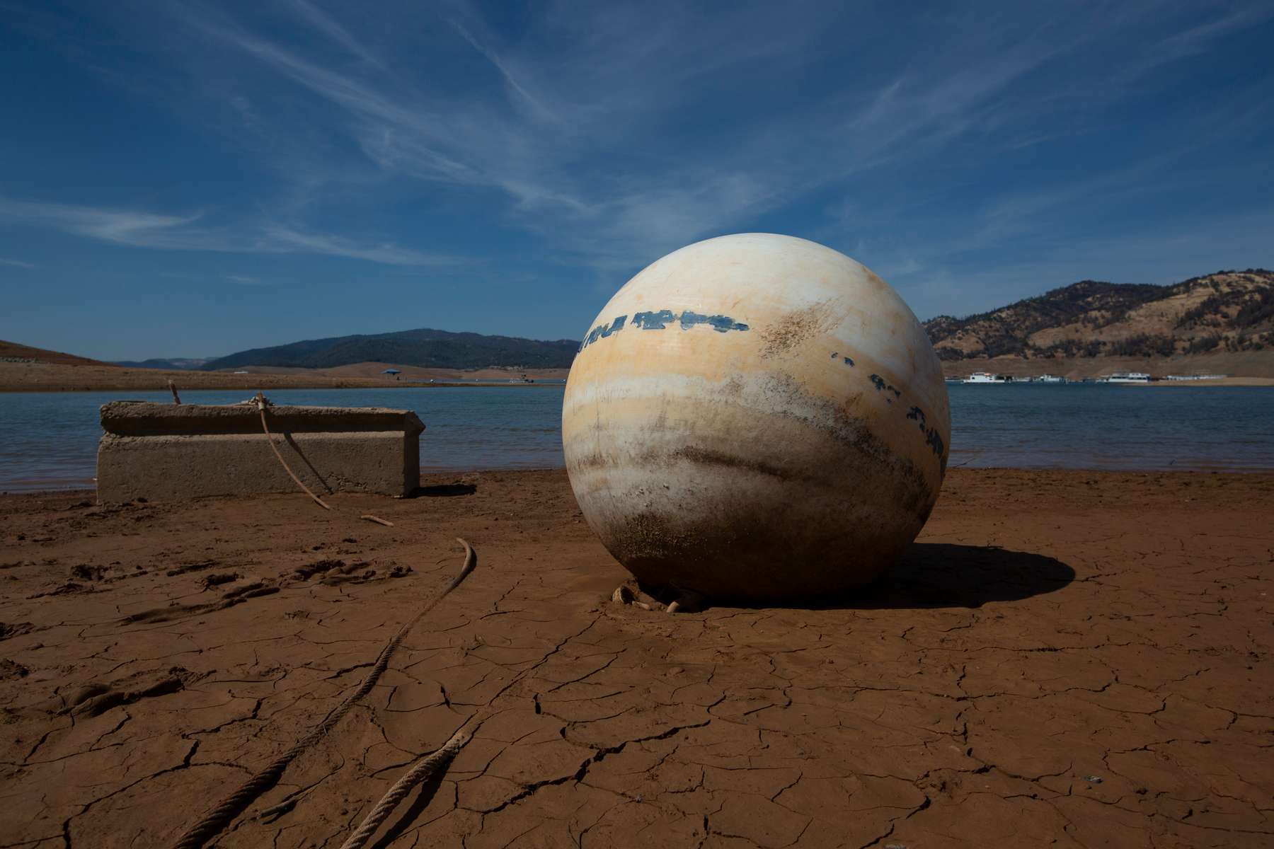 A buoy and its concrete anchor lay on the dry ground at Lake Oroville, California, U.S., June 16, 2021. Lake Oroville, the second largest reservoir in California is currently at 35% capacity. 