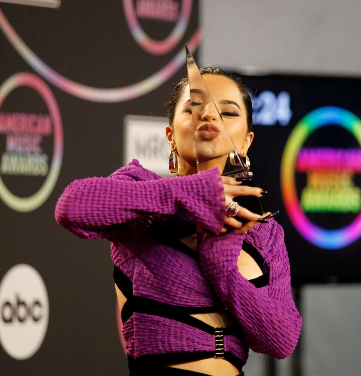 Becky G, winner of the Favorite Female Latin Award, poses in the press room during the 2021 American Music Awards at the  Microsoft Theater in Los Angeles, California, U.S., November 21, 2021. REUTERS/Aude Guerrucci