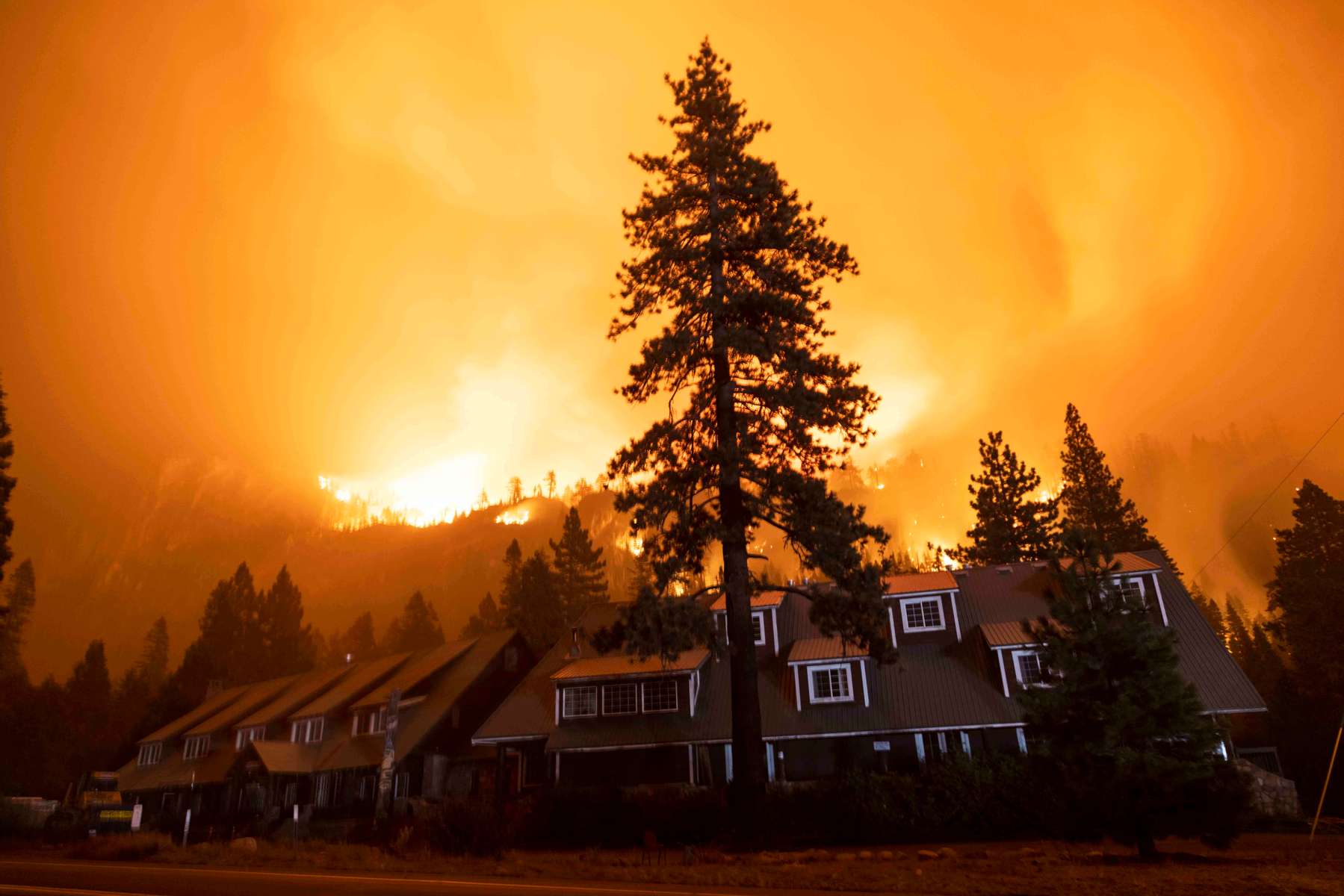 The Strawberry lodge stands as the Caldor fire rages on August 29, 2021, in the Eldorado National forest, California. The Caldor Fire has burned over 165,000 acres, destroyed over 660 structures and is currently 14 percent contained. 