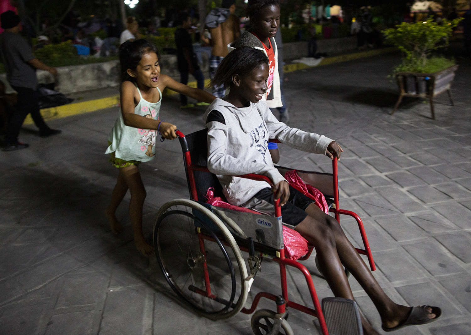 Children play before resting for the night  in Chahuites, Mexico November 8, 2021. 