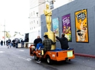 Workers carry an Oscar statue as preparations continue for the 96th Academy Awards in Los Angeles, California, U.S., March 9, 2024. 