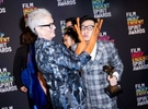 Jamie Lee Curtis hugs Ke Huy Quan in front of Michelle Yeoh, Dan Kwan, Stephanie Hsu, Jonathan Wang and  Daniel Scheinert in the press room during the 2023 Film Independent Spirit Awards in Santa Monica, U.S., March 4, 2023. 
