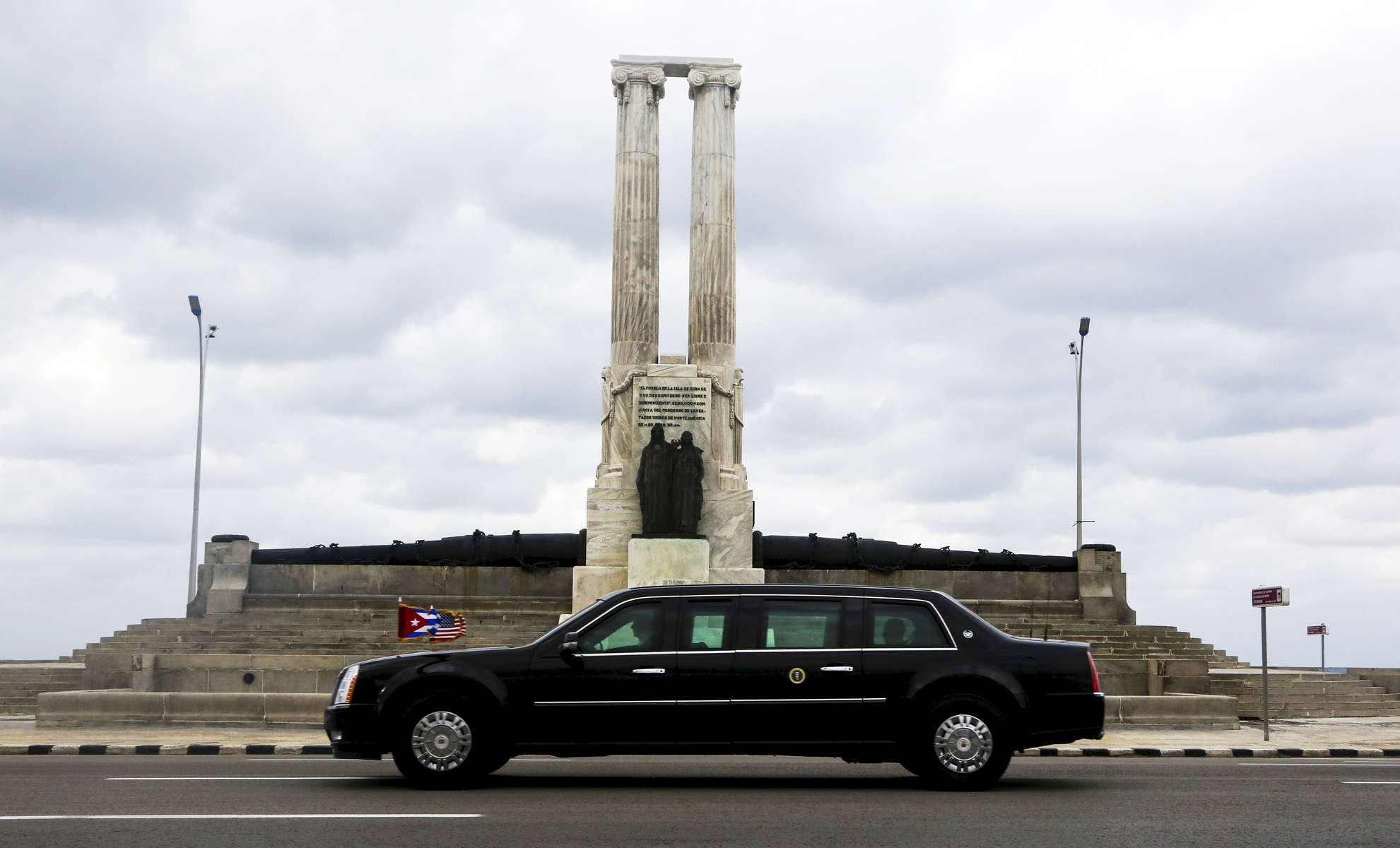 US Presidential motorcade drives on the Malecòn boulevard in Havana, Cuba. US President Barack Obama is doing a visit in Cuba, the first in 88 years by an American President. 