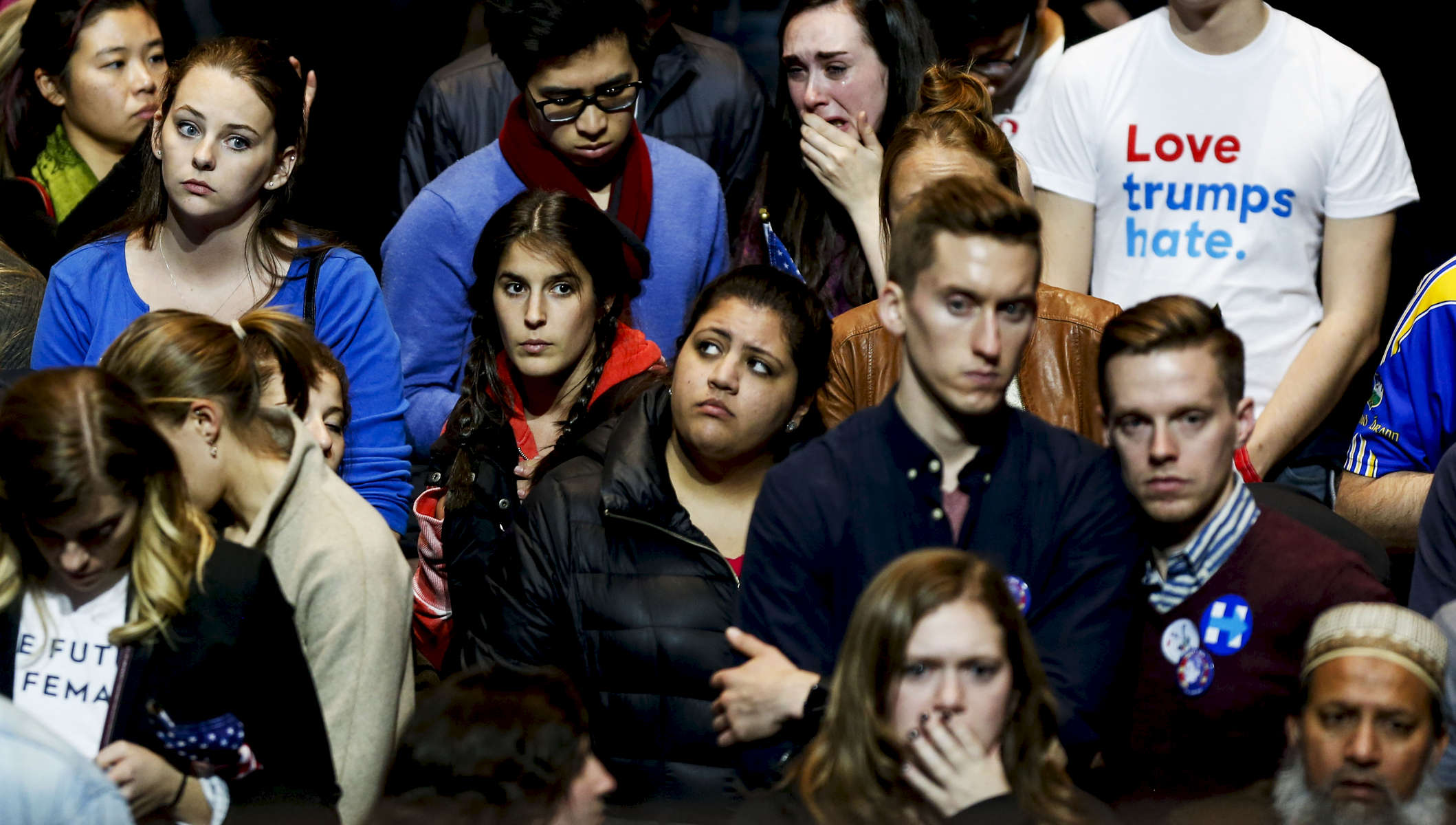 People react at the voting results at the Hillary Clinton's election night event in New York.