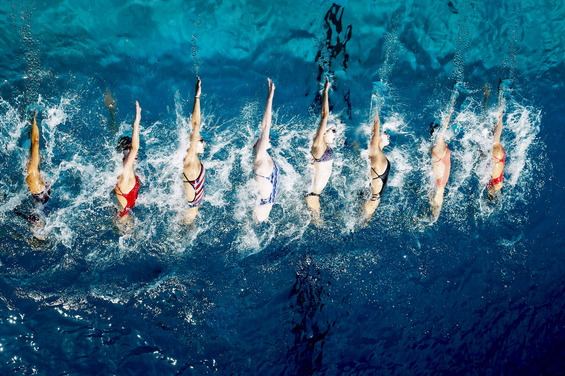 The US junior synchronized swimming team works on its routine.